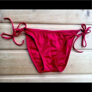Becca red bathing suit bottom with ties